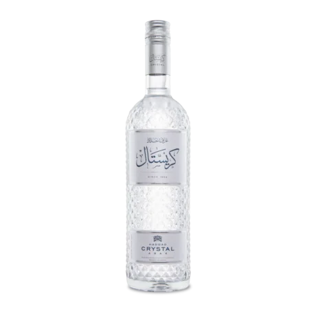 The elegant clear bottle of Arak Haddad Crystal featuring its blue and silver branding, representing the smoothest triple-distilled arak available for delivery in Amman.