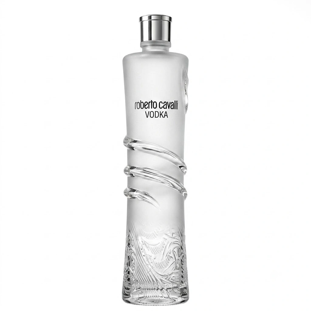 Vodka-Roberto-Cavalli-sip22-free-delivery-alcohol-delivery-amman-jordan 2 - sip22 The elegant glass bottle features frosted glass on the top half with the brand logo, and clear glass with a distinctive, textured twisting pattern on the bottom half. It is sealed with a polished silver cap.