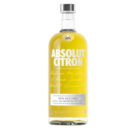 The frosted bottle of Absolut Citron Vodka with its iconic yellow script, a premium lemon and lime flavored spirit available for delivery in Amman, Jordan.