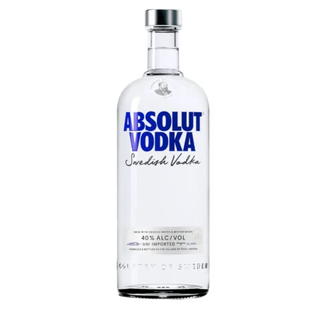 The iconic transparent bottle of Absolut Vodka Blue with its blue script and apothecary design, a premium Swedish spirit available for delivery in Amman.