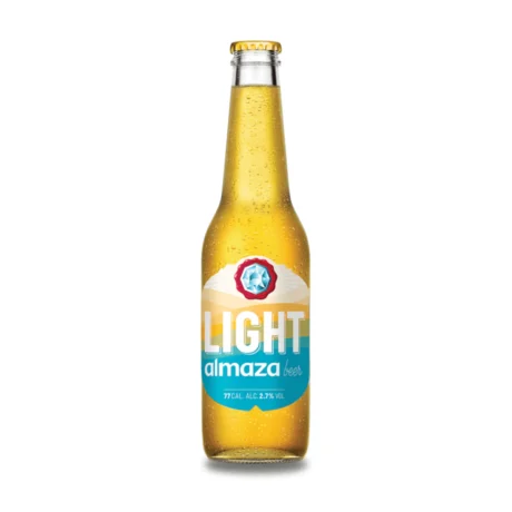 A bottle of Almaza Light 2.7% featuring its distinctive light-blue and silver label, a refreshing low-calorie Lebanese lager available for delivery in Amman.